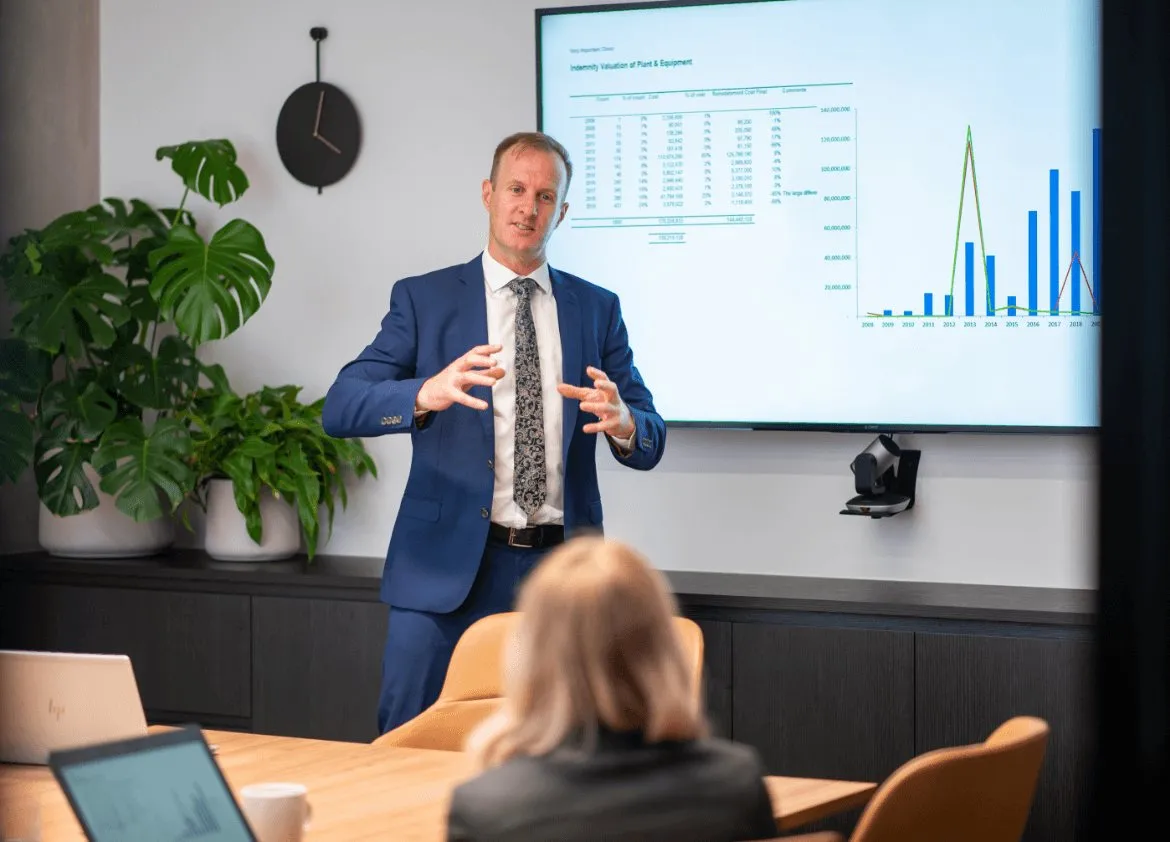 Valuer presenting a fair value analysis to a client
