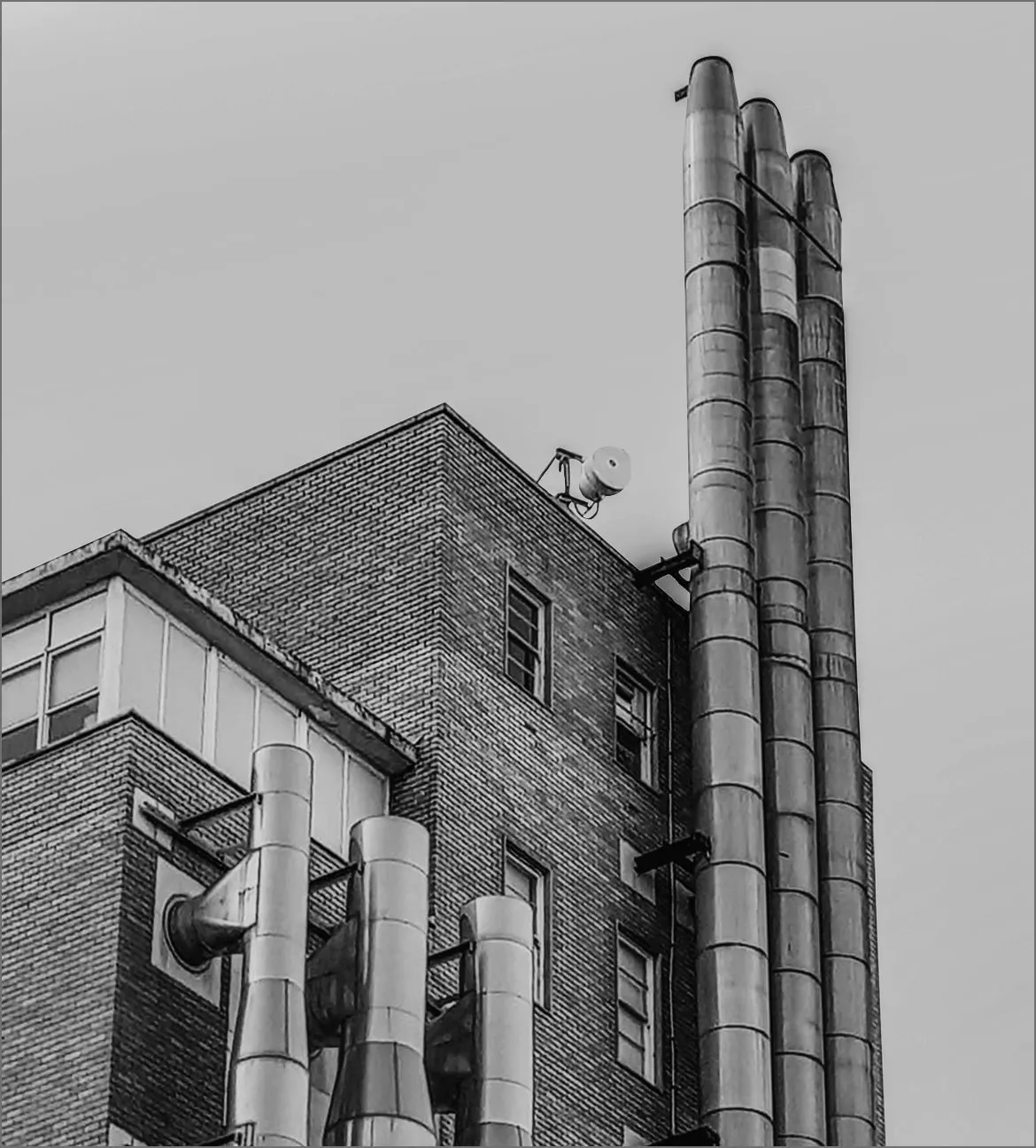Industrial chimney stacks at a processing plant