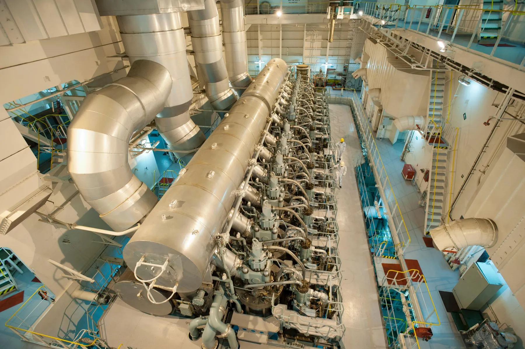 Large industrial machinery in a plant engine room, representing the property, plant and equipment assets accounted for under AASB 116