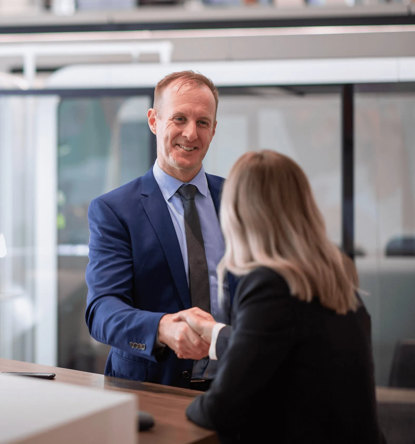 Valuer consulting with a client on a complex, dispersed asset group valuation